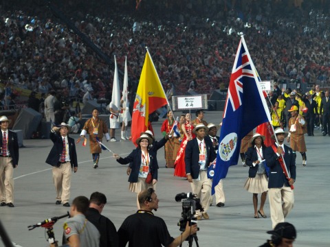 Cayman Team at the Olympic Opening Ceremony. L-R in the photo are: Attaché - Matthew Bishop, Swimming Coach - Dominic Ross, Chef de Mission - Lori Powell, Swimmer - Brett Fraser (200 back), Athletics Coach - Kenrick Williams, Track athlete - Cydonie Mothersill (200 m) Track athlete & Flag Bearer - Ronald Forbes (110 hurdles)
