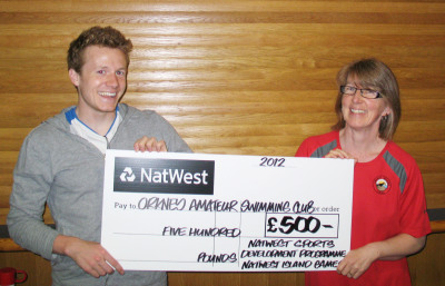 r-l Coach Bobby Oag and Orkney ASC President Helen Rothnie with cheque for £500 from the NatWest Sports Development Programme